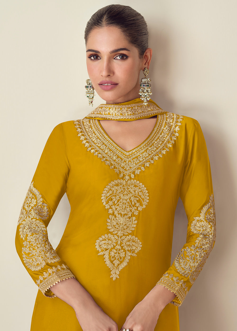 Buy Now Premium Chinnon Yellow Embroidered Palazzo Style Suit Online in USA, UK, Canada, Germany, Italy & Worldwide at Empress Clothing. 