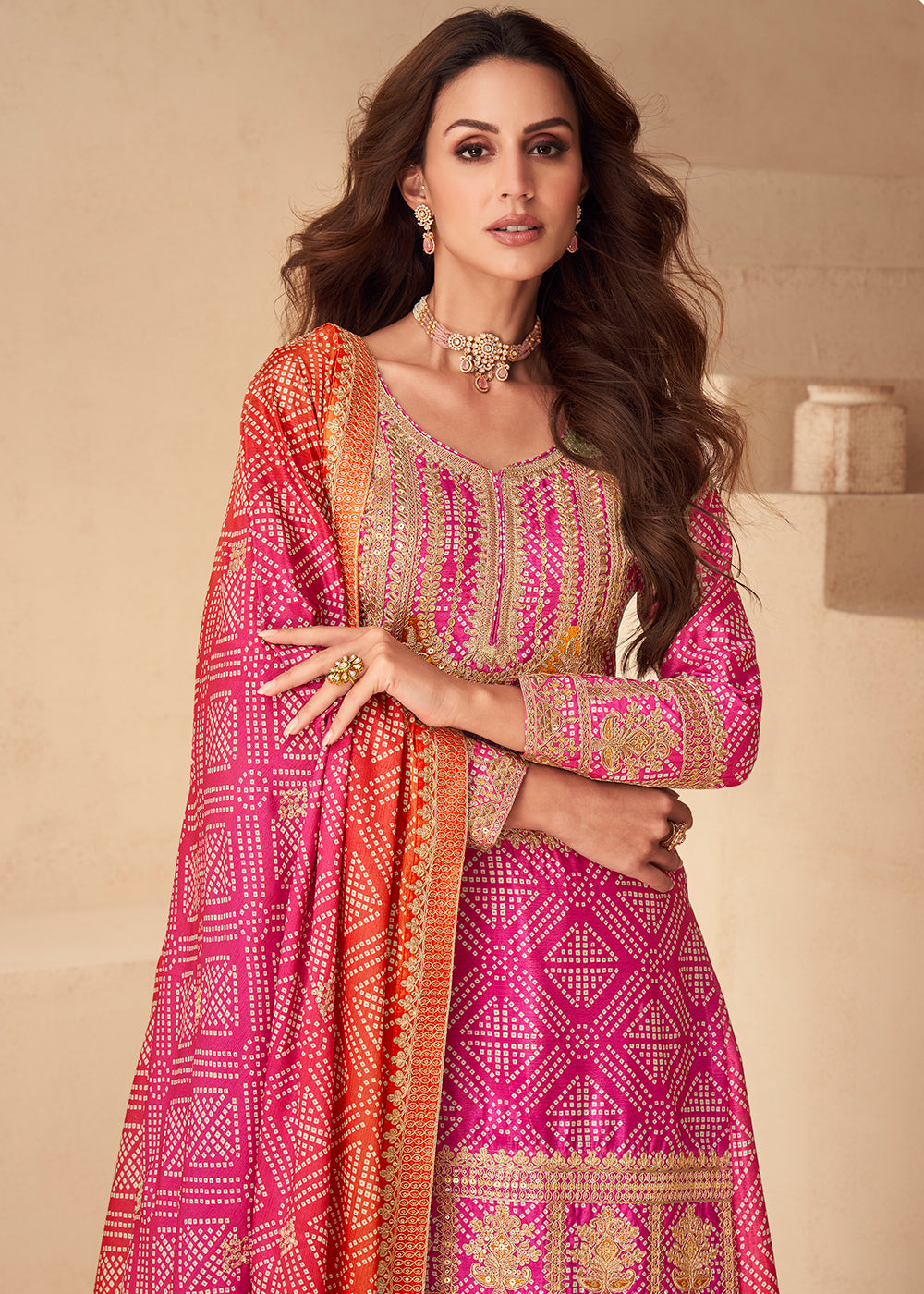 Buy Now Pink Bandhej Zari Embroidered Festive Palazzo Suit Online in Newark, Yorktown, Toronto, London, Munich, Chicago, Denver, Utah & Worldwide at Empress.