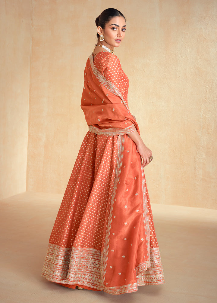 Buy Now Orange Pure Organza Jacquard Silk Festive Anarkali Gown Online in USA, UK, Australia, Italy, Germany, Canada, France & Worldwide at Empress Clothing.