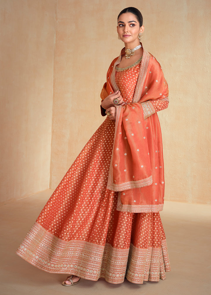Buy Now Orange Pure Organza Jacquard Silk Festive Anarkali Gown Online in USA, UK, Australia, Italy, Germany, Canada, France & Worldwide at Empress Clothing.