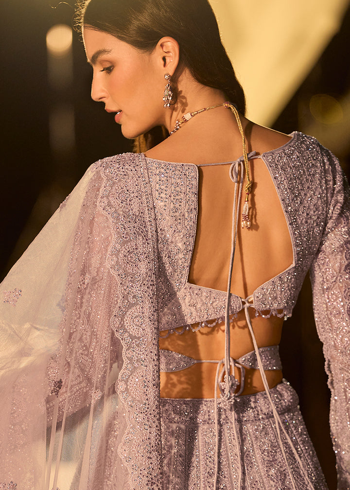 Buy Now Pastel Lilac Net Reception Wear Lehenga Choli Online in US, UK, Canada, France, Germany, Sweden, Greece, Denmark, Spain, UAE & Worldwide at Empress.