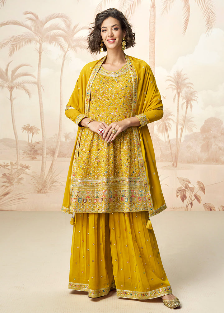 Buy Now Yellow Real Georgette Embellished Palazzo Style Suit Online in USA, UK, Canada, Germany, Italy, France, Austria, UAE & Worldwide at Empress Clothing.