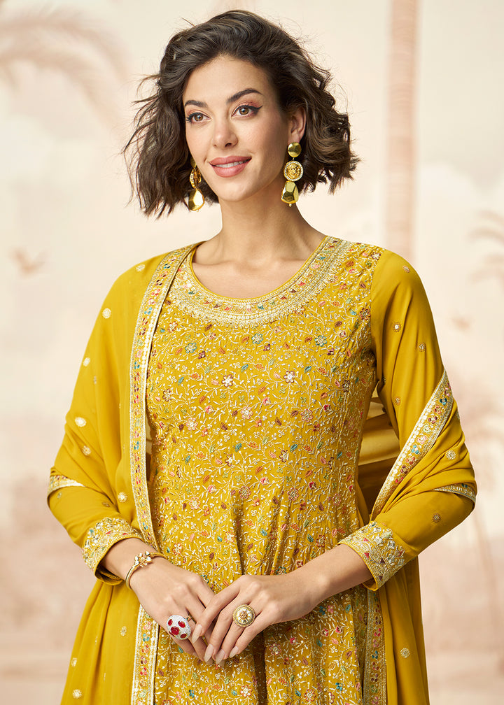 Buy Now Yellow Real Georgette Embellished Palazzo Style Suit Online in USA, UK, Canada, Germany, Italy, France, Austria, UAE & Worldwide at Empress Clothing.