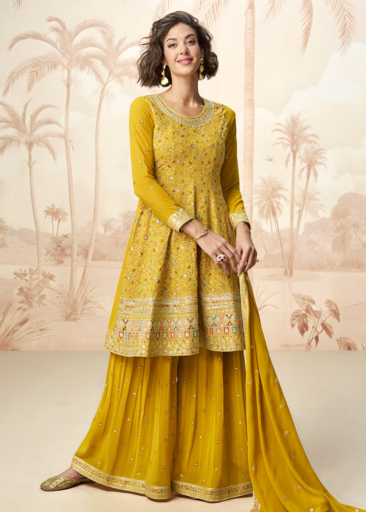 Buy Now Yellow Real Georgette Embellished Palazzo Style Suit Online in USA, UK, Canada, Germany, Italy, France, Austria, UAE & Worldwide at Empress Clothing.