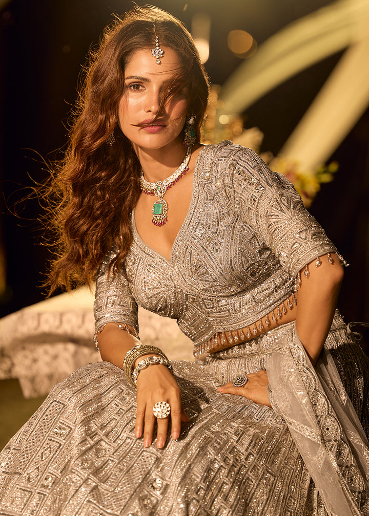 Buy Now Pastel Silver Grey Net Reception Wear Lehenga Choli Online in US, UK, Canada, France, Germany, Sweden, Greece, Denmark, Spain, UAE & Worldwide at Empress.