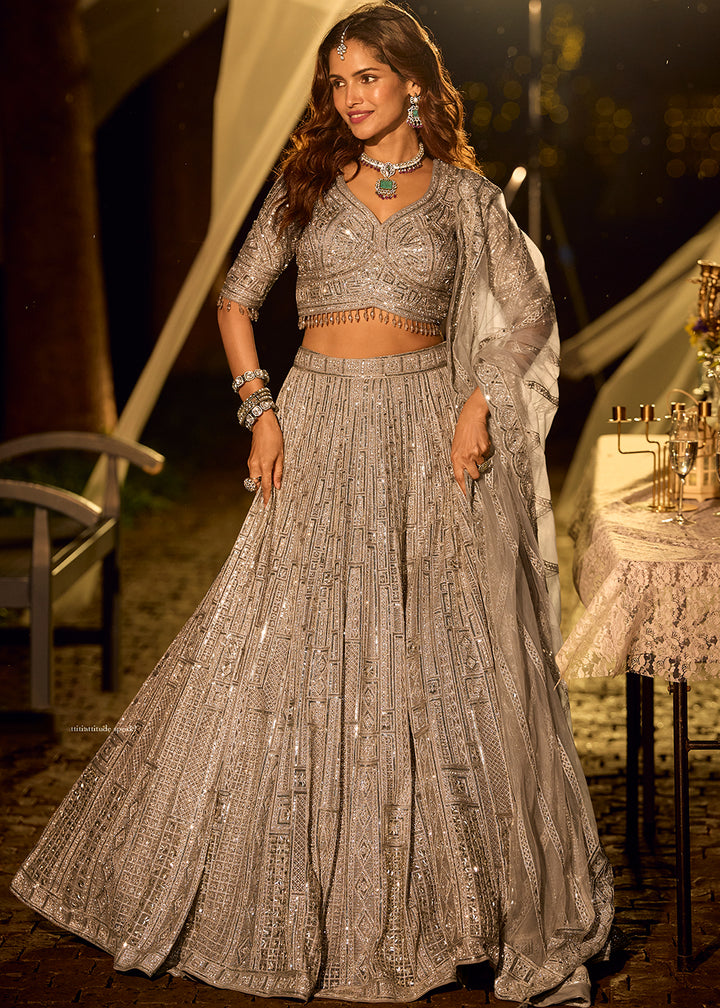 Buy Now Pastel Silver Grey Net Reception Wear Lehenga Choli Online in US, UK, Canada, France, Germany, Sweden, Greece, Denmark, Spain, UAE & Worldwide at Empress.