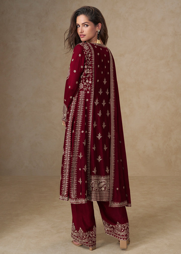 Buy Now Maroon Palazzo Chinnon Silk Embroidered Festive Suit Suit Online in US, UK, Canada, Germany, Italy, France, Austria, UAE & Worldwide at Empress Clothing.