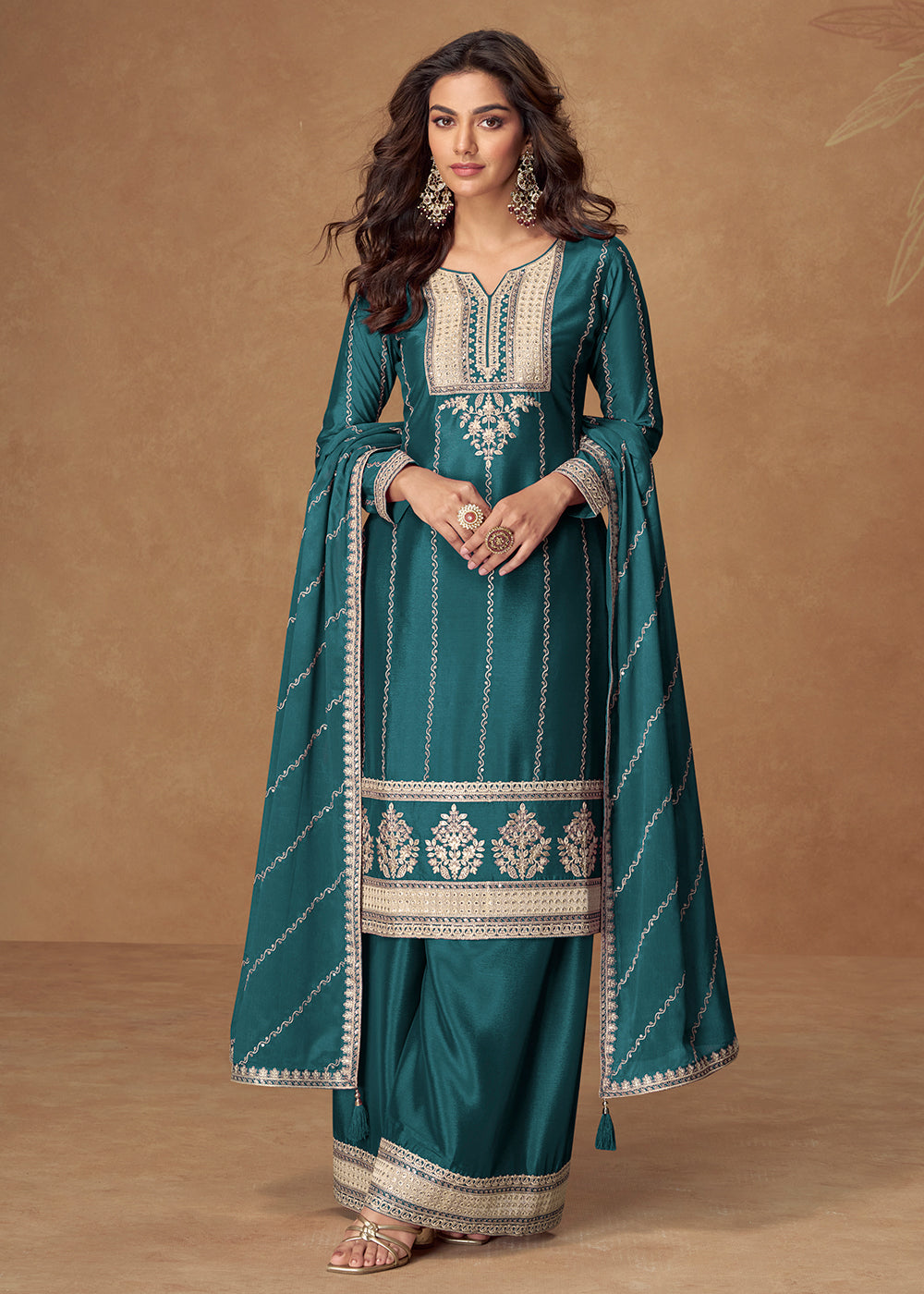 Buy Now Green Chinnon Silk Embroidered Wedding Wear Suit Suit Online in USA, UK, Canada, Germany, Italy, France, Singapore, UAE & Worldwide at Empress Clothing.