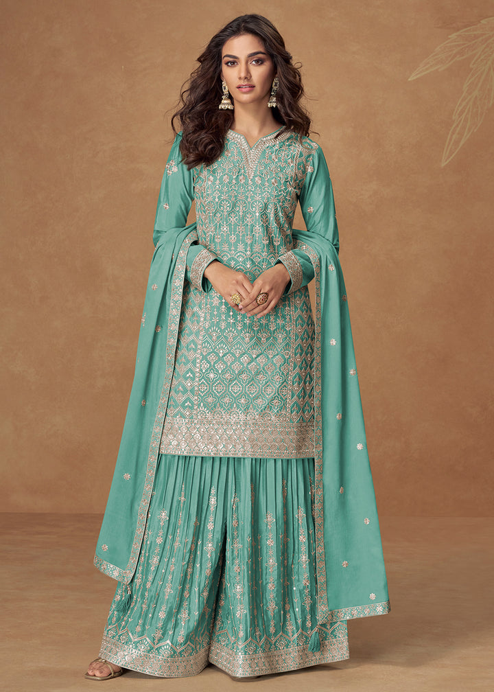 Buy Now Turquoise Zari Embroidered Wedding Wear Palazzo Suit Online in USA, UK, Canada, Germany, Italy, France, Denmark, UAE & Worldwide at Empress Clothing.