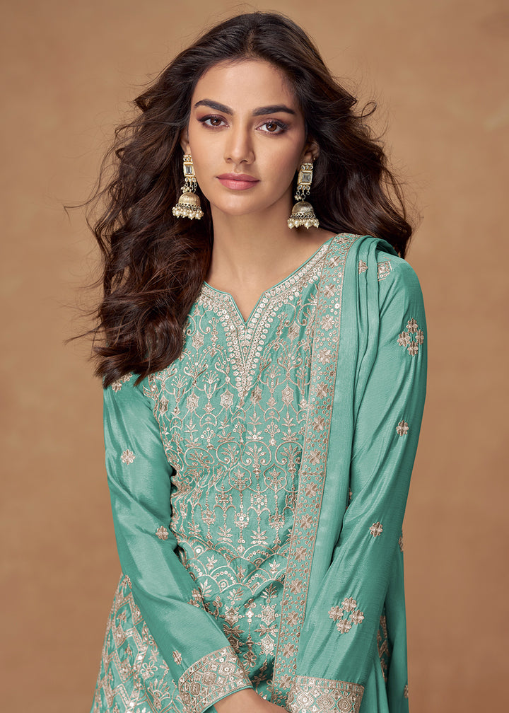 Buy Now Turquoise Zari Embroidered Wedding Wear Palazzo Suit Online in USA, UK, Canada, Germany, Italy, France, Denmark, UAE & Worldwide at Empress Clothing.