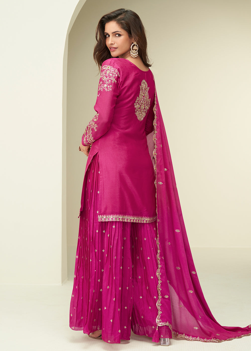 Buy Now Charming Pink Sangeet Wear Palazzo Style Suit Online in US, UK, Canada, Germany, Italy, France, Austria, Denmark, Australia, UAE & Worldwide at Empress.
