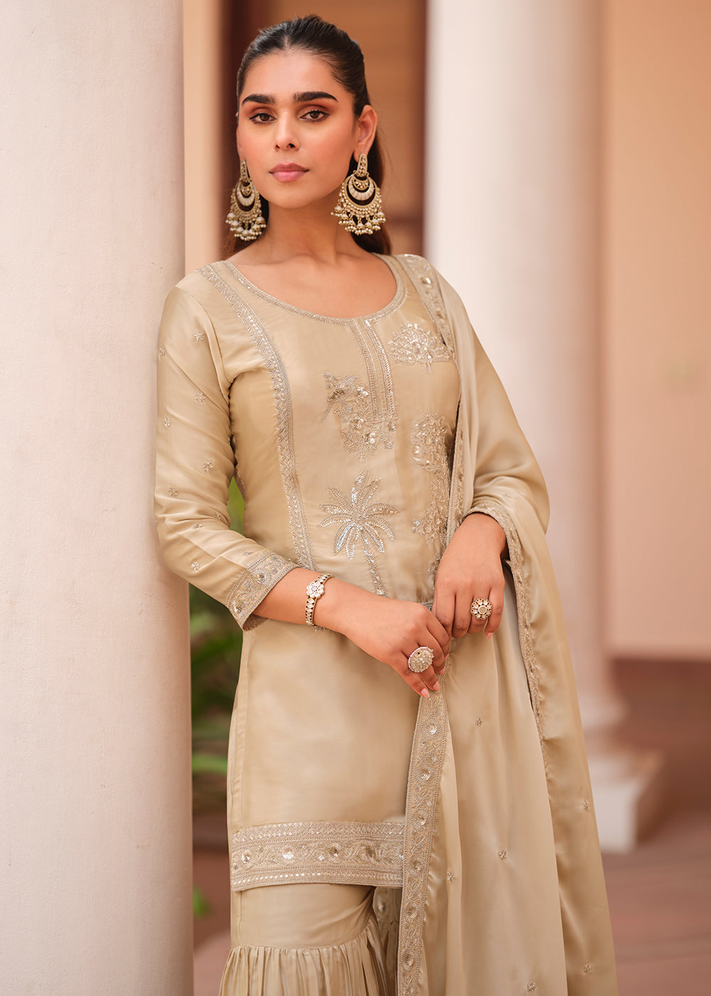 Shop Now Beige Silk Satin Embroidered Gharara Style Suit Online at Empress Clothing in USA, UK, Canada, Germany, Australia, Sweden, Denmark, UAE & Worldwide.