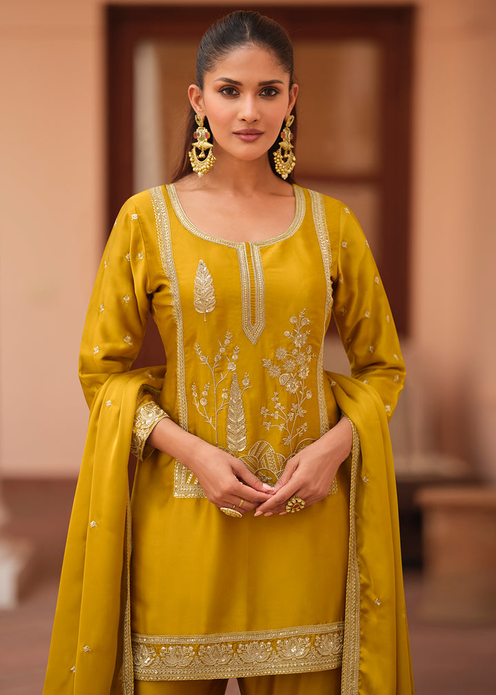 Shop Now Mustard Silk Satin Embroidered Gharara Style Suit Online at Empress Clothing in USA, UK, Canada, Germany, Australia, Sweden, Denmark, UAE & Worldwide.