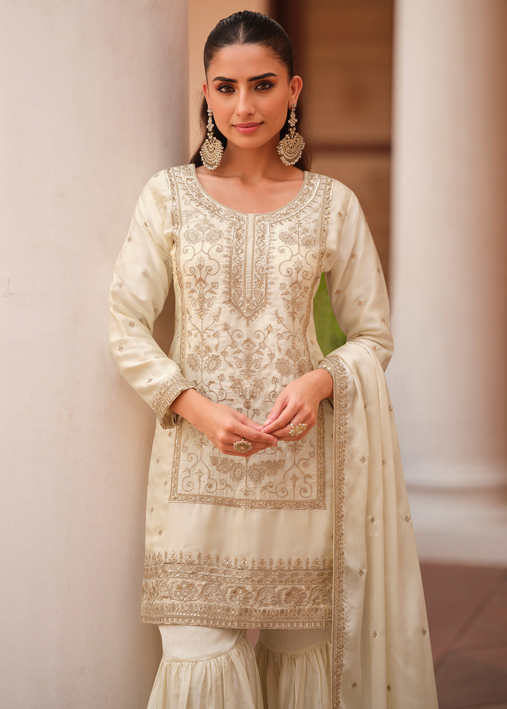 Shop Now Off White Silk Satin Embroidered Gharara Style Suit Online at Empress in USA, UK, Canada, Germany, Australia, Sweden, Denmark, UAE, Qatar & Worldwide.