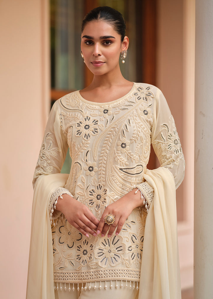 Buy Now Beautiful Ivory Georgette Trouser Style Suit Online in Newark, Yorktown, Toronto, London, Munich, Chicago, Denver, Utah, Paris & Worldwide at Empress.