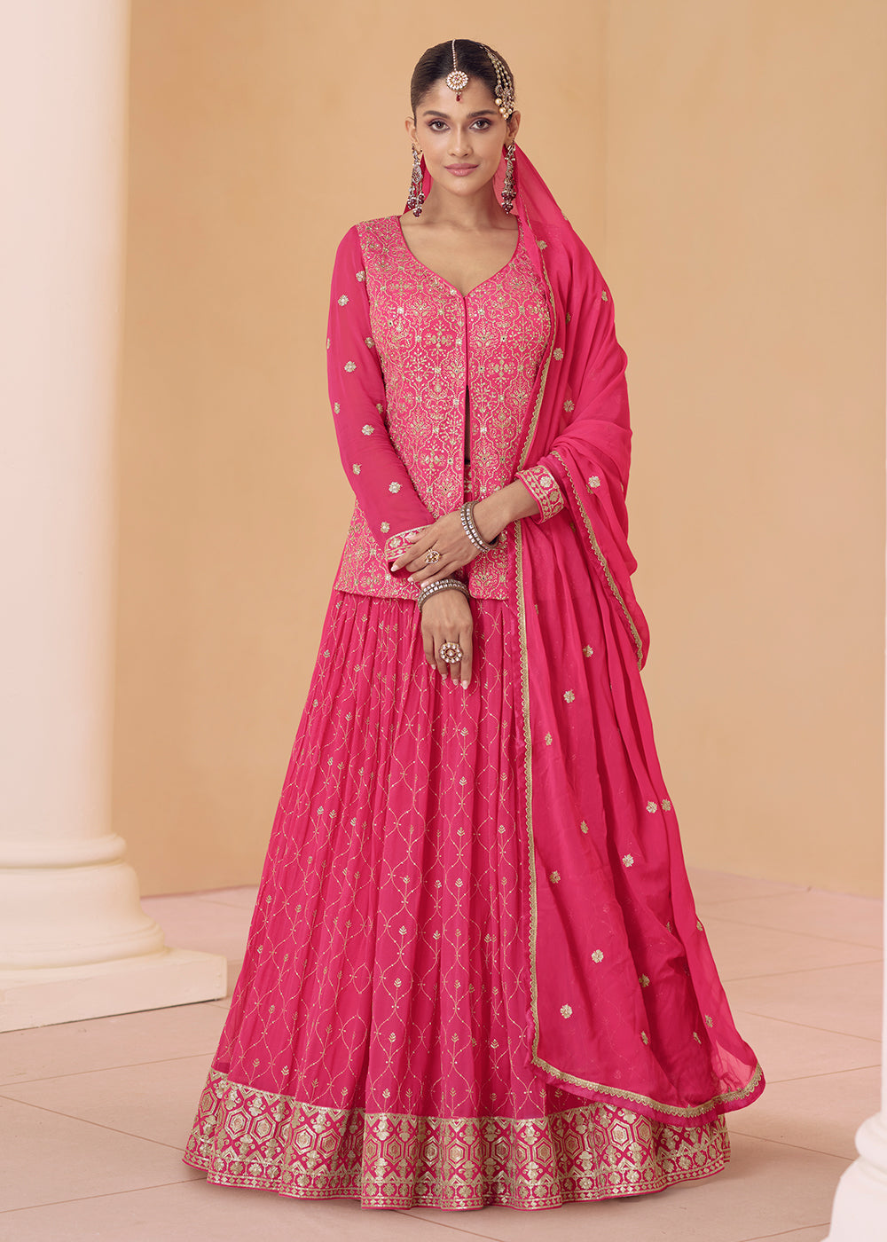 Ruby Red Georgette Wedding Lehenga Choli with Intricate Embroidery.