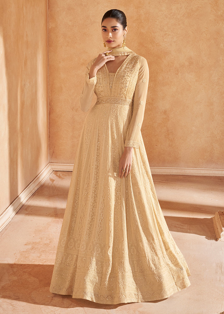 Buy Now Gold Beige Chikankari Embroidered Wedding Anarkali Gown Online in USA, UK, Australia, UAE, France, Italy, Canada & Worldwide at Empress Clothing. 