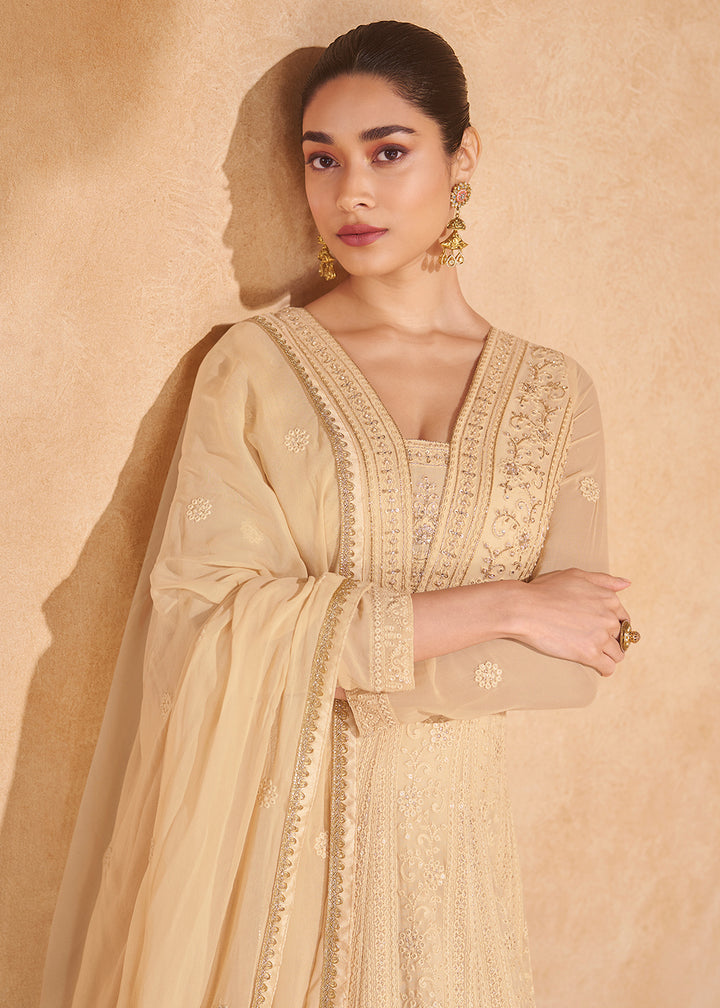 Buy Now Gold Beige Chikankari Embroidered Wedding Anarkali Gown Online in USA, UK, Australia, UAE, France, Italy, Canada & Worldwide at Empress Clothing. 