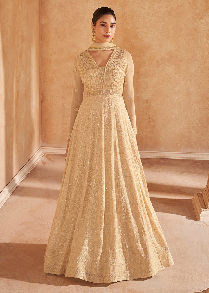 Buy Now Gold Beige Chikankari Embroidered Wedding Anarkali Gown Online in USA, UK, Australia, UAE, France, Italy, Canada & Worldwide at Empress Clothing. 