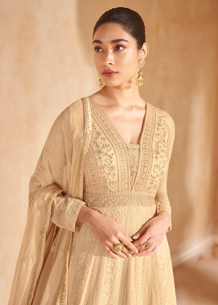 Buy Now Gold Beige Chikankari Embroidered Wedding Anarkali Gown Online in USA, UK, Australia, UAE, France, Italy, Canada & Worldwide at Empress Clothing. 