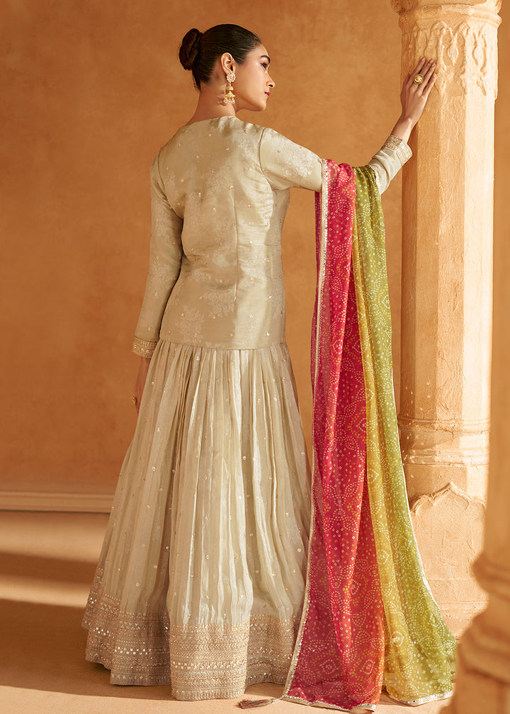 Buy Now Lovely Cream Viscose Silk Bridesmaids Lehenga Choli Online in USA, UK, Canada, UAE & Worldwide at Empress Clothing. 