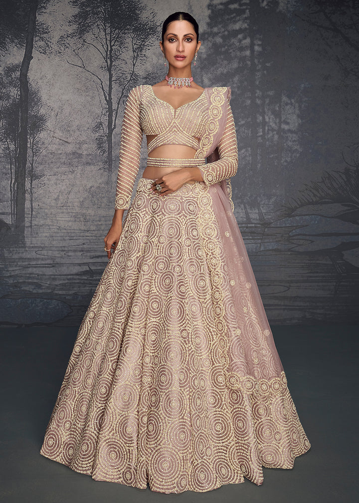 Buy Now Lilac Pink Net Hand Embroidered Designer Lehenga Choli Online in USA, UK, Canada, France & Worldwide at Empress Clothing. 