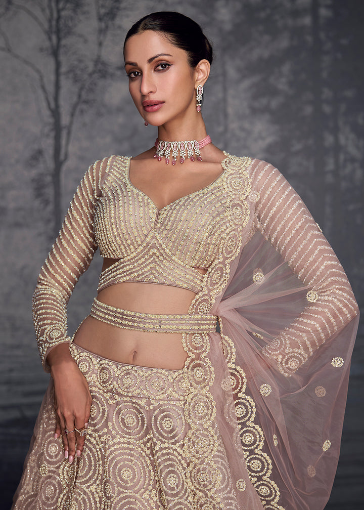 Buy Now Lilac Pink Net Hand Embroidered Designer Lehenga Choli Online in USA, UK, Canada, France & Worldwide at Empress Clothing. 