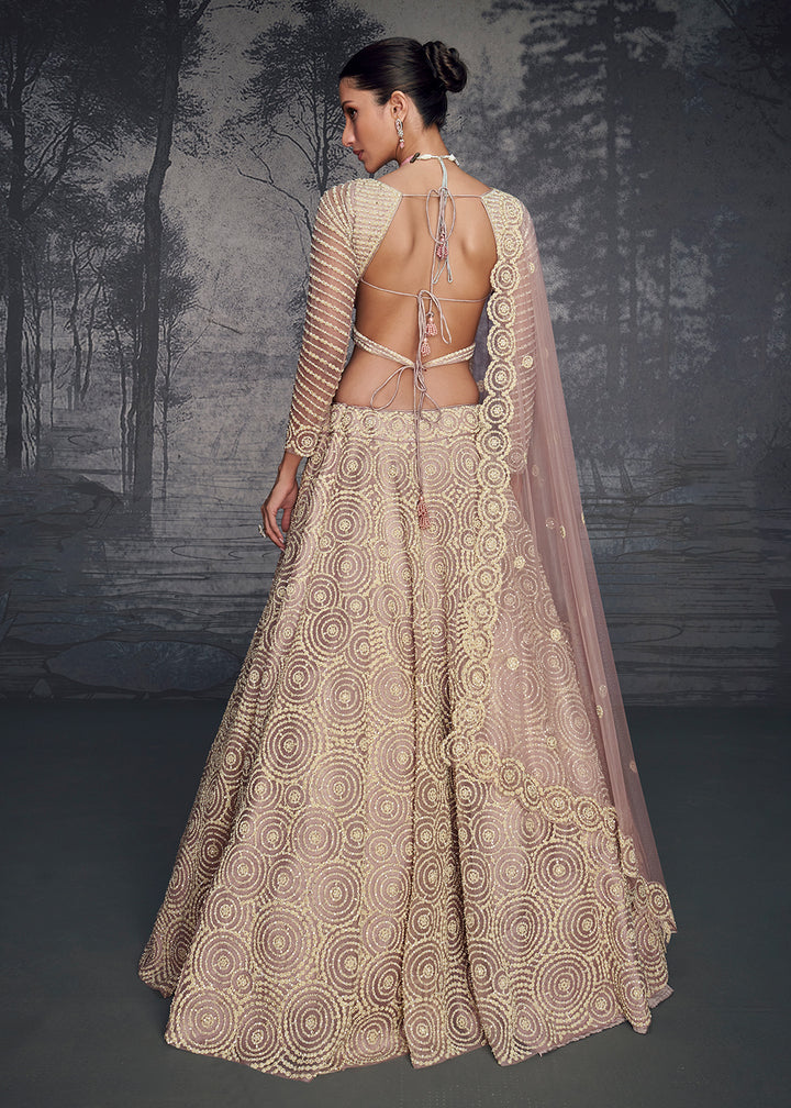 Buy Now Lilac Pink Net Hand Embroidered Designer Lehenga Choli Online in USA, UK, Canada, France & Worldwide at Empress Clothing. 