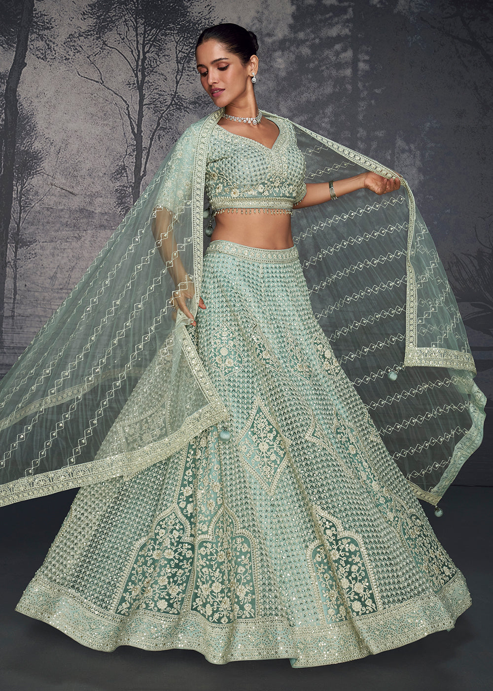 Buy Now Sea Green Net Hand Embroidered Designer Lehenga Choli Online in USA, UK, Canada, France & Worldwide at Empress Clothing. 