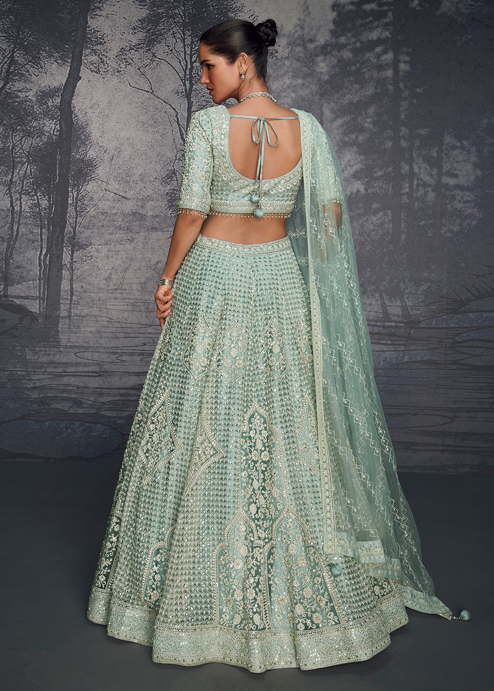 Buy Now Sea Green Net Hand Embroidered Designer Lehenga Choli Online in USA, UK, Canada, France & Worldwide at Empress Clothing. 