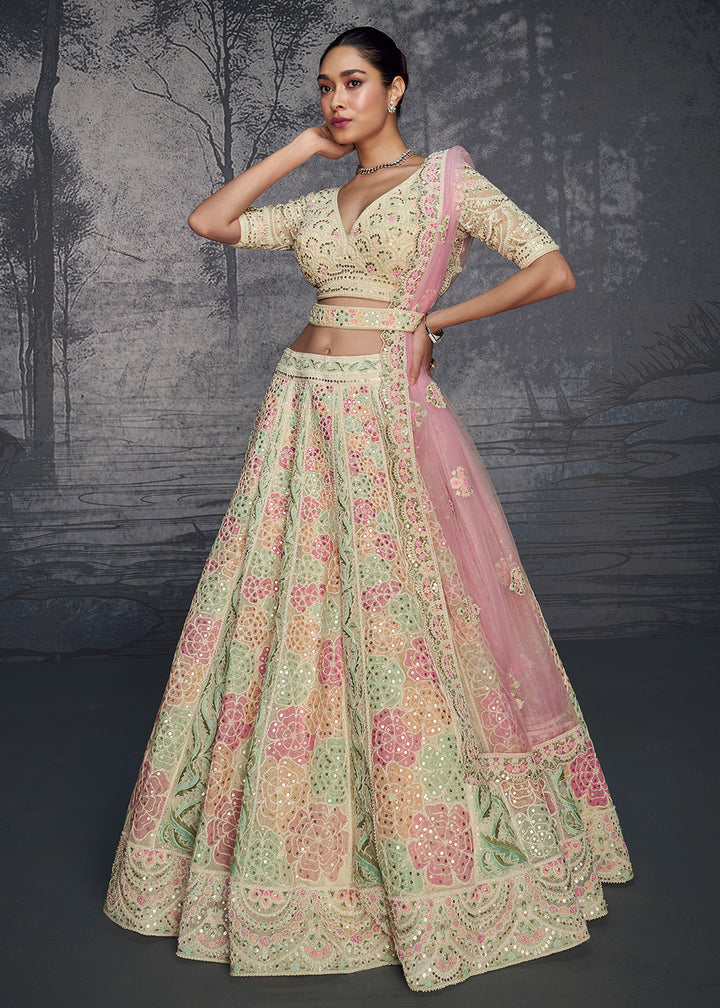 Buy Now Ivory Pink Net Hand Embroidered Designer Lehenga Choli Online in USA, UK, Canada, France & Worldwide at Empress Clothing.