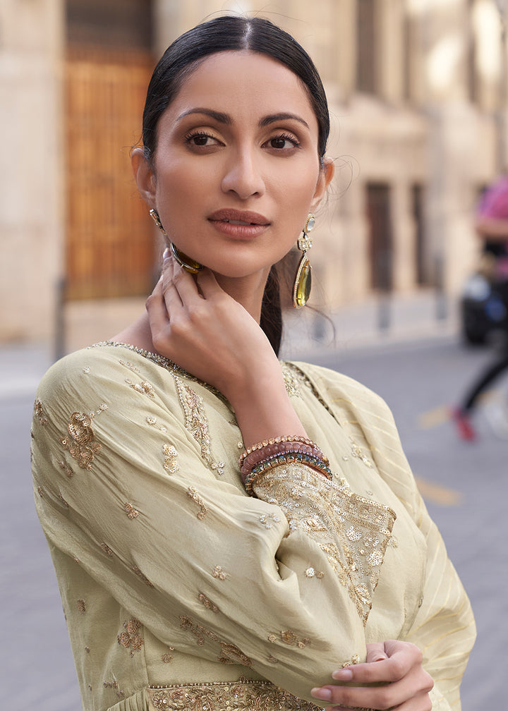 Shop Now Creamy Beige Shimmer Silk Embroidered Sharara Style Suit Online in USA, UK, Canada, France, Qatar, Germany, Italy, UAE & Worldwide at Empress Clothing.