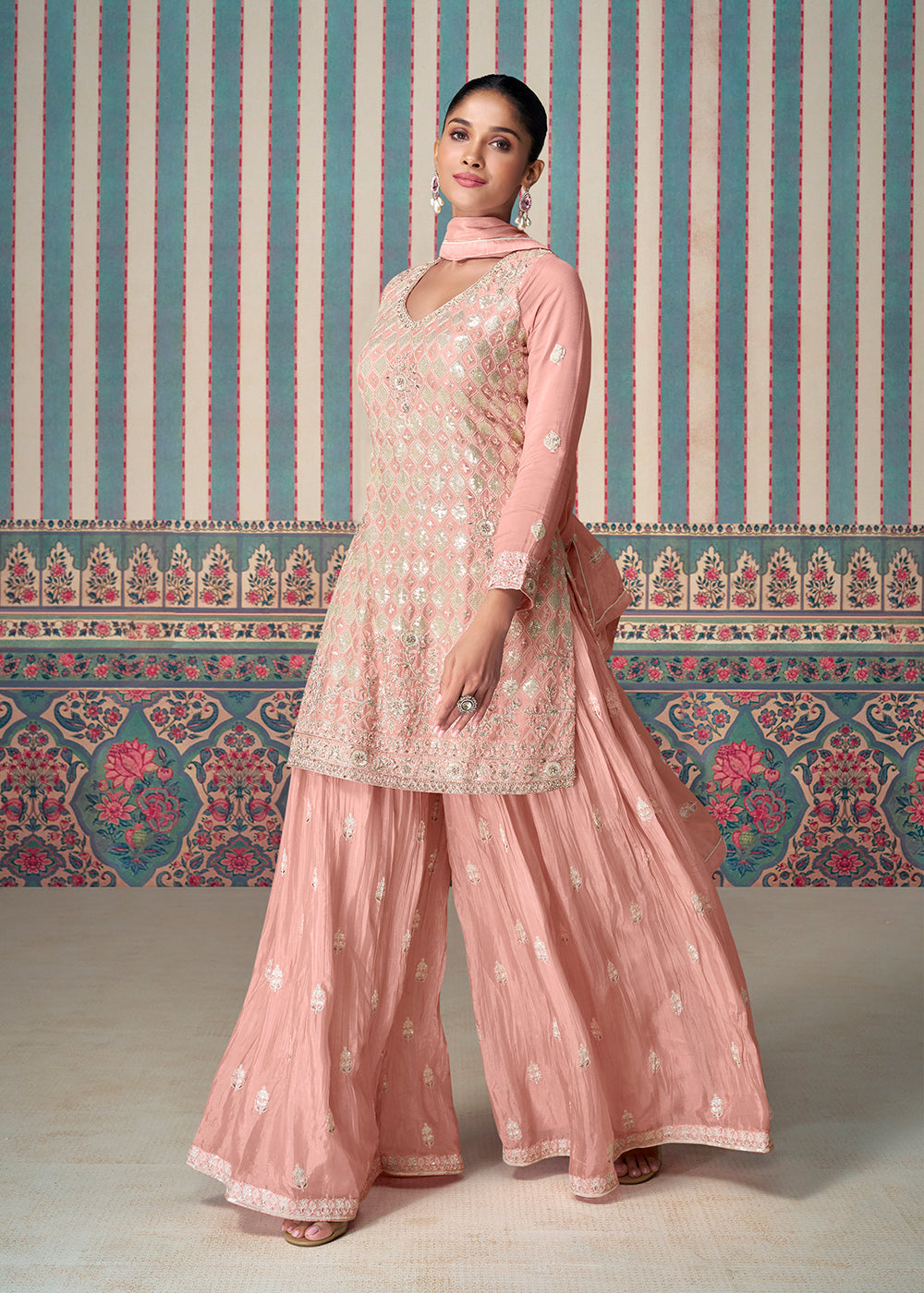 Shop Now Peachy Pink Premium Embroidered Designer Sharara Suit Online at Empress Clothing in USA, UK, Canada, Germany, Australia & Worldwide.