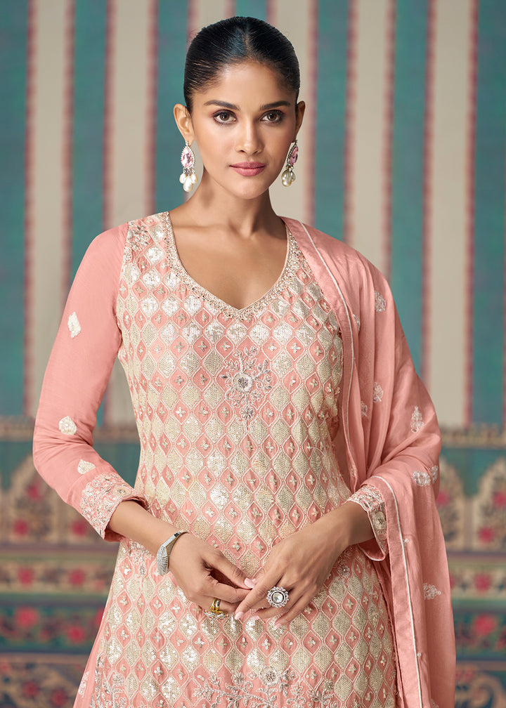 Shop Now Peachy Pink Premium Embroidered Designer Sharara Suit Online at Empress Clothing in USA, UK, Canada, Germany, Australia & Worldwide.