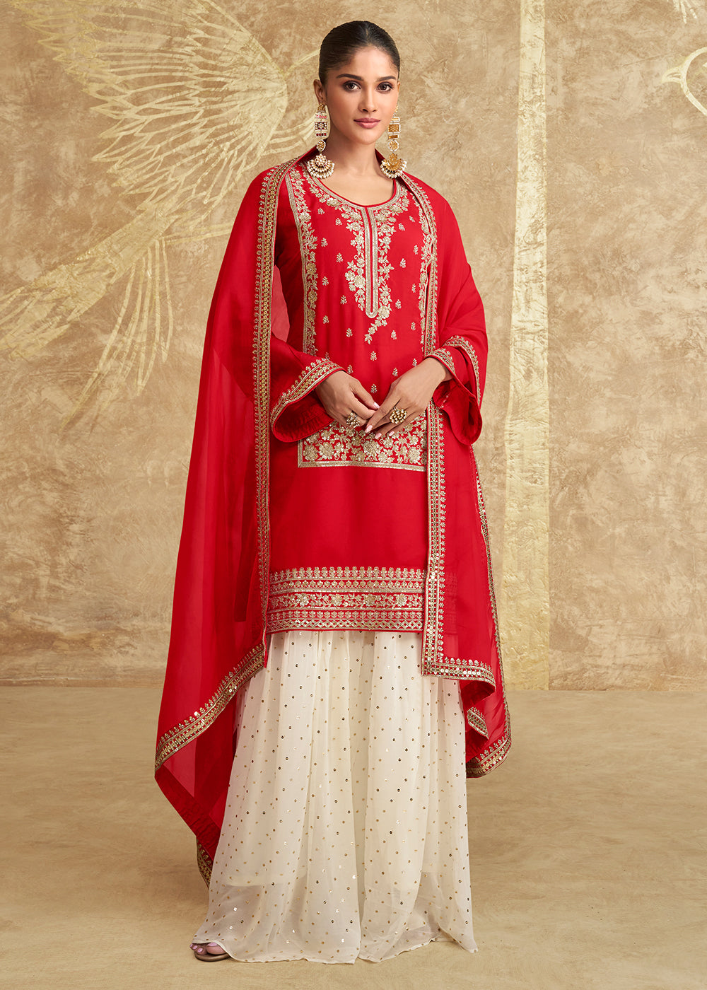 Shop Now Hot Red Embroidered Chinnon Silk Sharara Suit Online at Empress Clothing in USA, UK, Canada, Germany, UAE & Worldwide. 