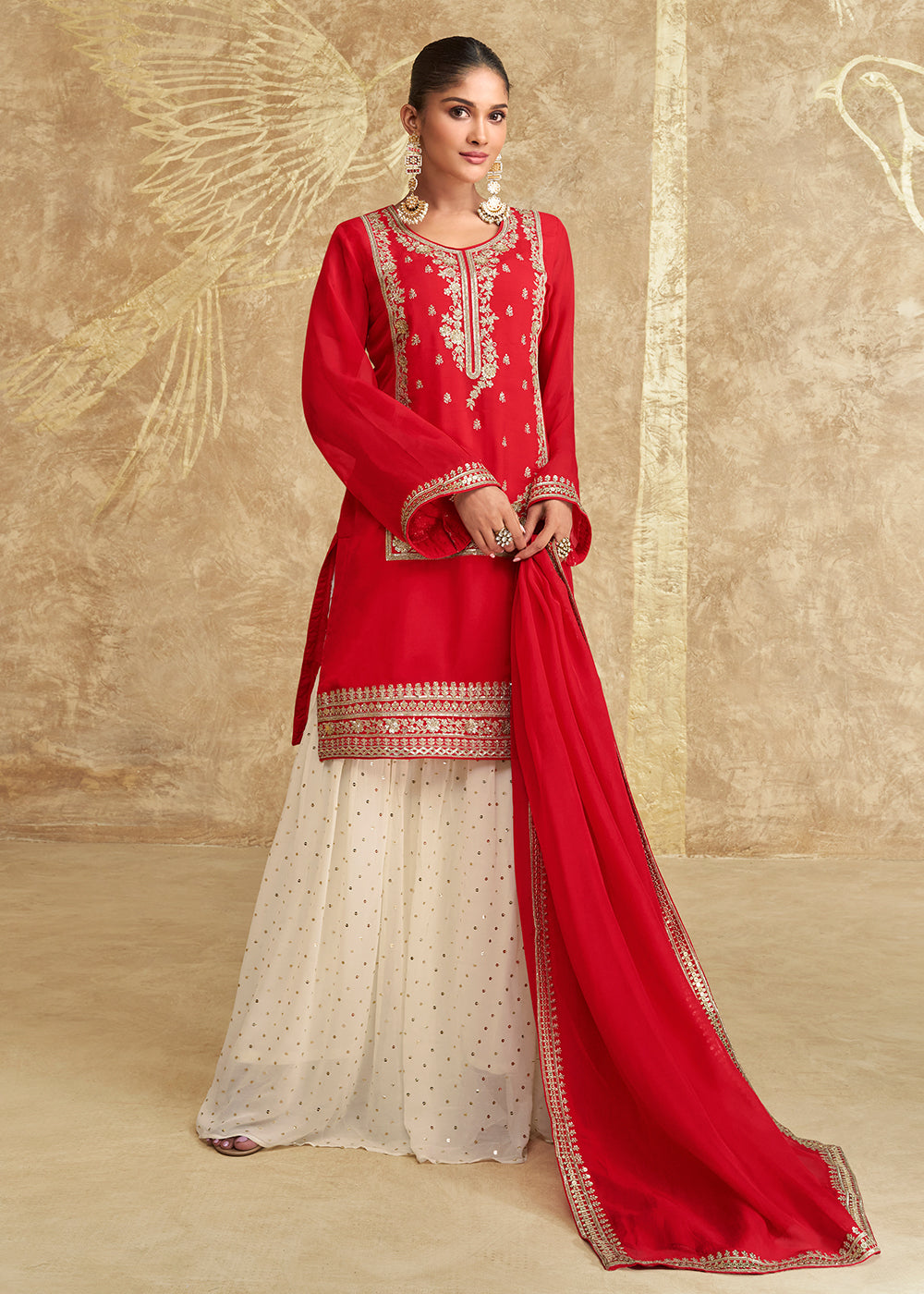 Shop Now Hot Red Embroidered Chinnon Silk Sharara Suit Online at Empress Clothing in USA, UK, Canada, Germany, UAE & Worldwide. 