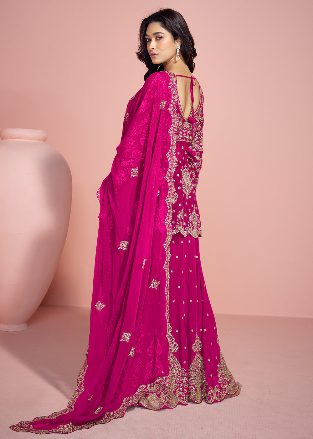 Buy Now Rani Pink Palazzo Style Embroidered  Festive Style Suit Online in USA, UK, Canada, Germany, Italy & Worldwide at Empress Clothing. 