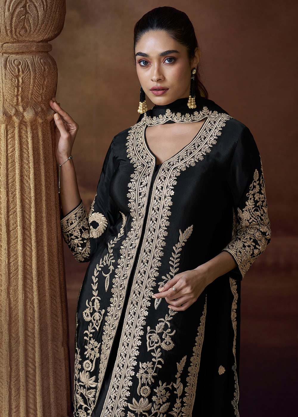 Buy Now Designer Black Chinnon Embroidered Eid Style Salwar Suit Online in USA, UK, Canada, Germany, Italy, UAE, France & Worldwide at Empress Clothing. 