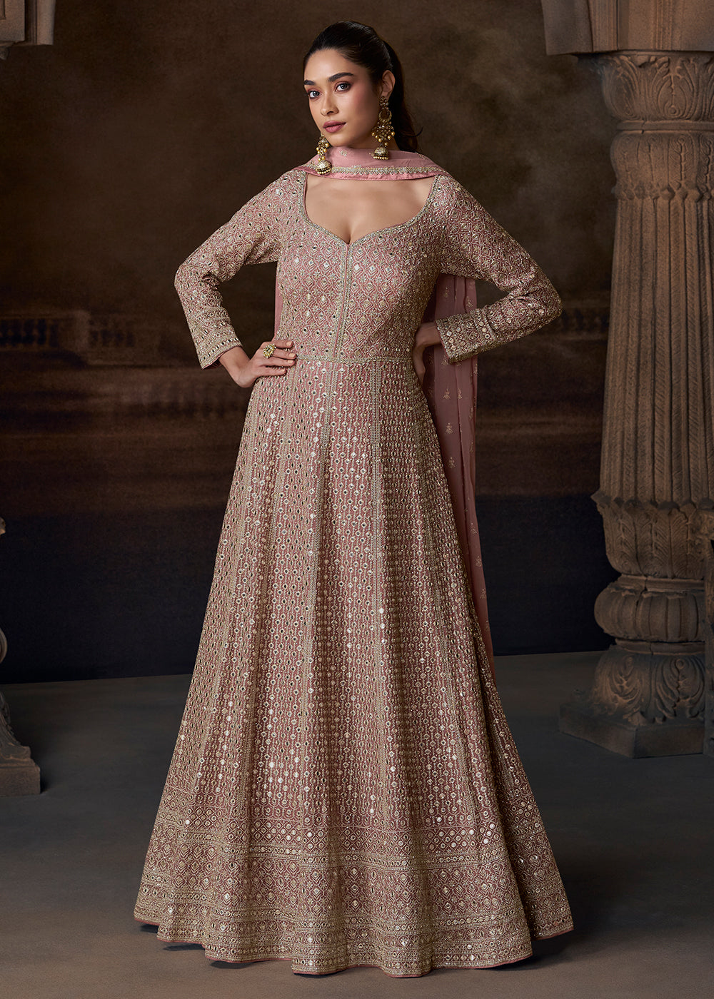 Buy Now Old Rose Pink Heavy Embroidered Wedding Anarkali Gown Online in US, UK, Canada, France, Italy, Singapore, UAE, Austria & Worldwide at Empress Clothing.