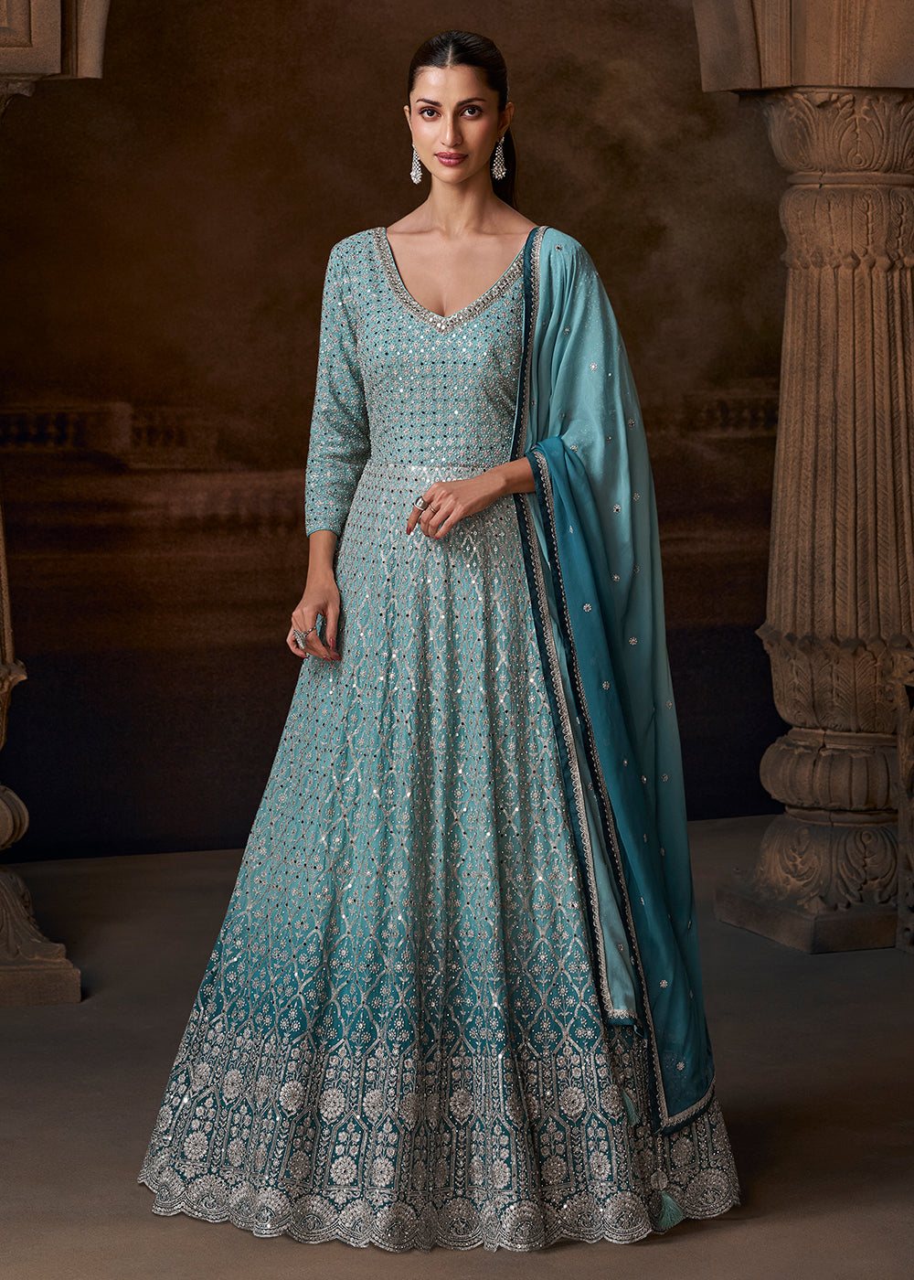 Buy Now Ombre Sea Blue Heavy Embroidered Wedding Anarkali Gown Online in US, UK, Canada, France, Italy, Singapore, UAE, Austria & Worldwide at Empress Clothing.