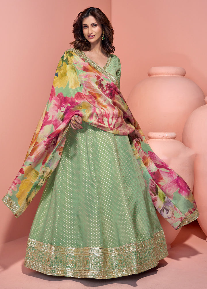 Buy Now Green Viscose Jacquard Silk Festive Anarkali Suit Online in US, UK, Australia, Italy, Germany, Canada, France, UAE & Worldwide at Empress Clothing.