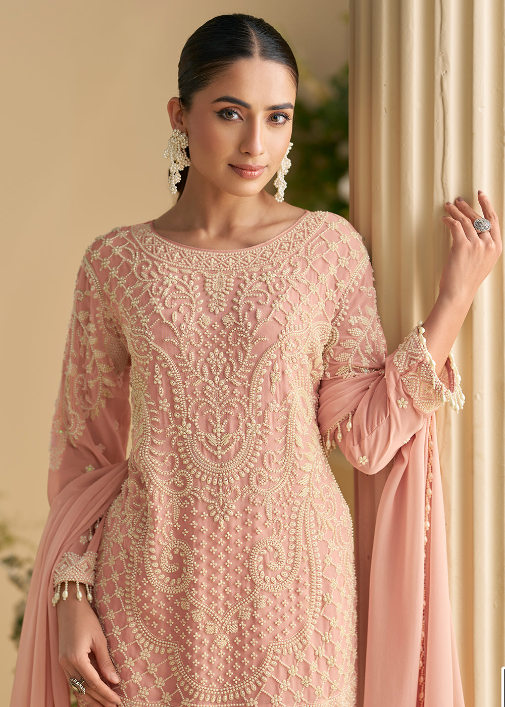 Buy Now Blush Peach Georgette Chikankari Pant Style Suit Online in US, UK, Canada, Germany, Italy, France, Austria, Denmark, UAE & Worldwide at Empress Clothing.