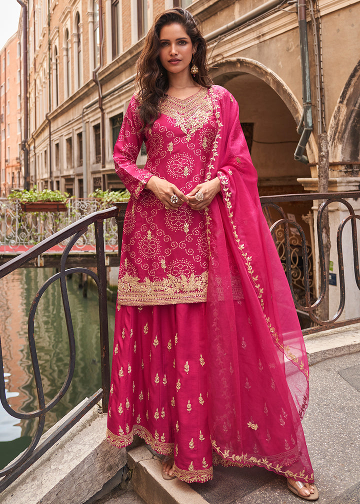 Buy Now Rani Pink Zari Threads Palazzo Style Suit Online in US, UK, Canada, Germany, Italy, France, Austria, Australia, UAE, Denmark & Worldwide at Empress.