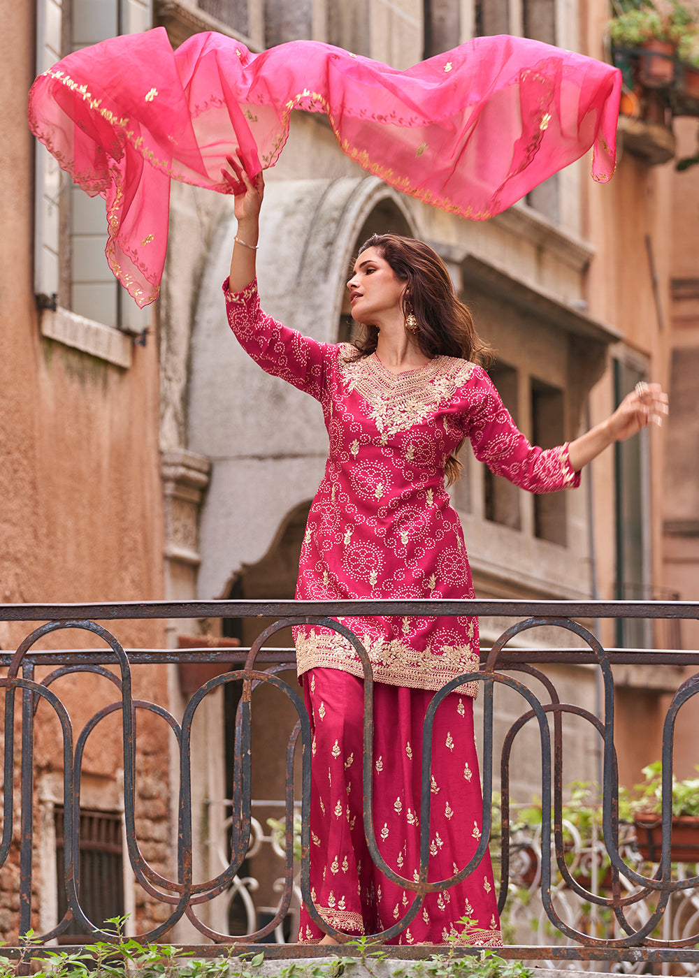 Buy Now Rani Pink Zari Threads Palazzo Style Suit Online in US, UK, Canada, Germany, Italy, France, Austria, Australia, UAE, Denmark & Worldwide at Empress.