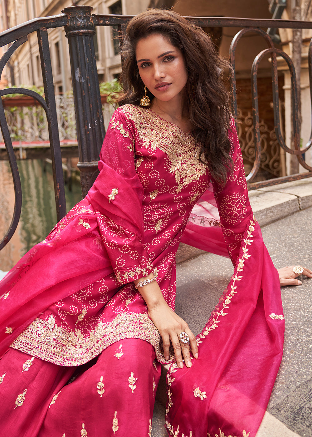 Buy Now Rani Pink Zari Threads Palazzo Style Suit Online in US, UK, Canada, Germany, Italy, France, Austria, Australia, UAE, Denmark & Worldwide at Empress.