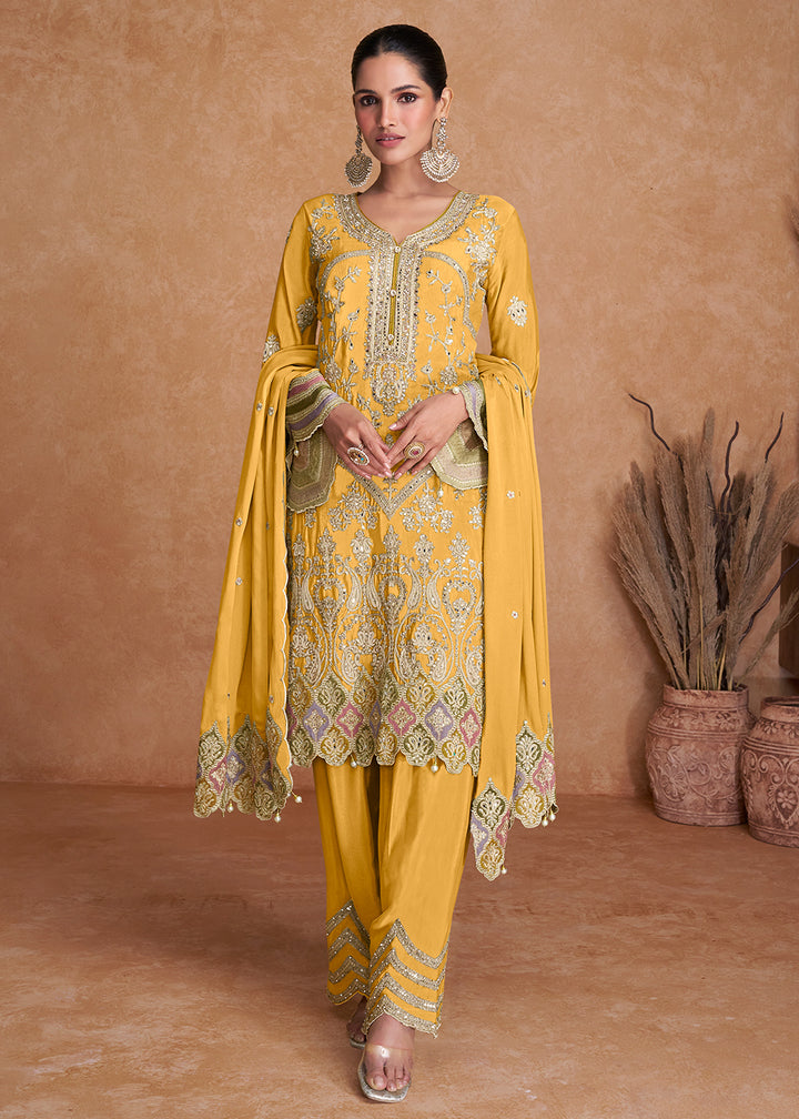 Buy Now Yellow Chinnon Fabric Embroidered Designer Salwar Suit Online in USA, UK, Canada, Germany, Australia & Worldwide at Empress Clothing. 