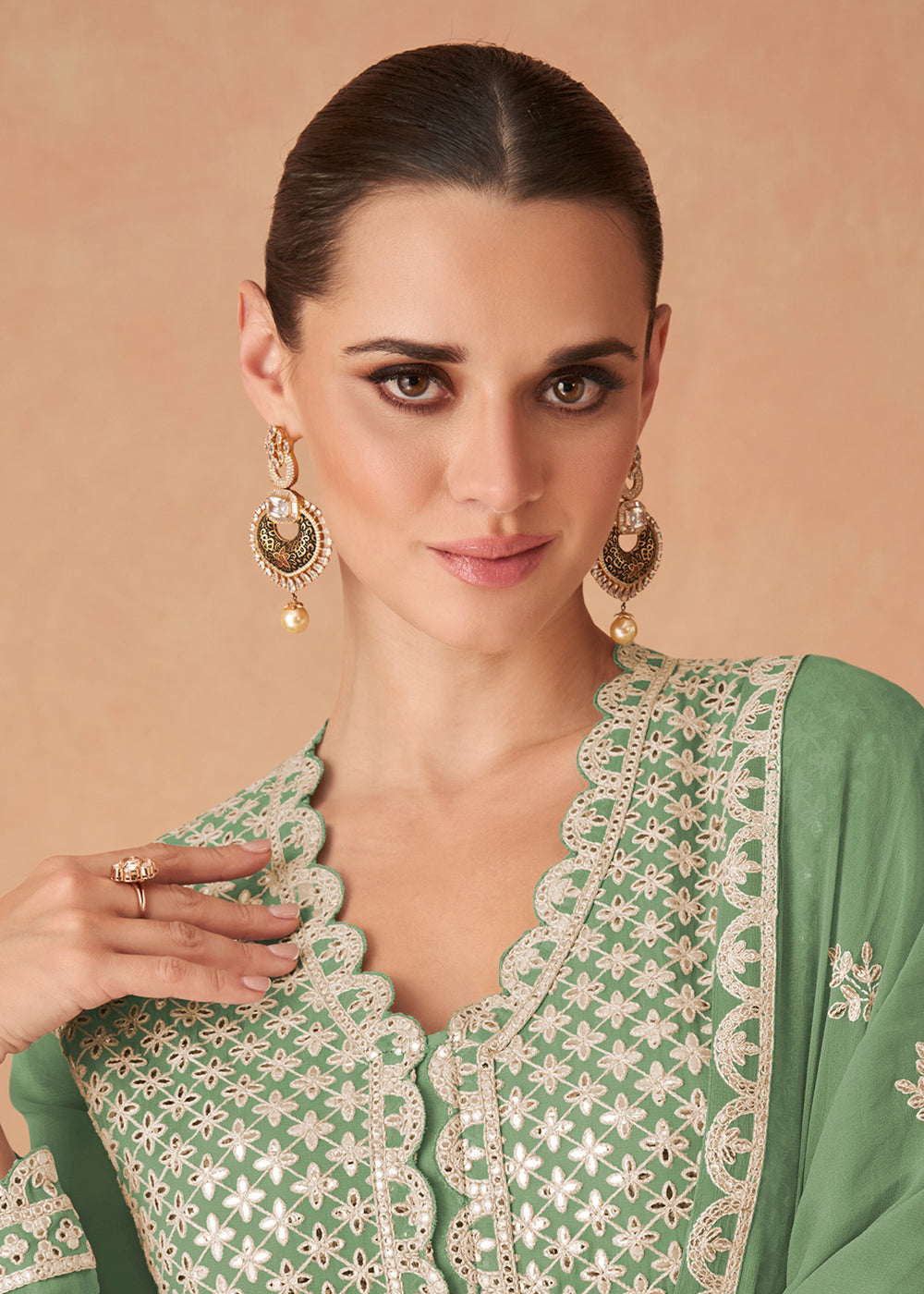 Buy Now Light Green Georgette Skirt Style Anarkali Gown Online in US, UK, Canada, France, Italy, Sweden, Ireland, UAE, Denmark, Greece & Worldwide at Empress.