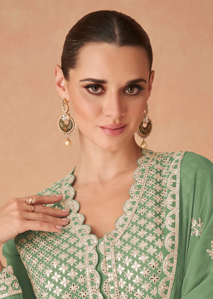 Buy Now Light Green Georgette Skirt Style Anarkali Gown Online in US, UK, Canada, France, Italy, Sweden, Ireland, UAE, Denmark, Greece & Worldwide at Empress.