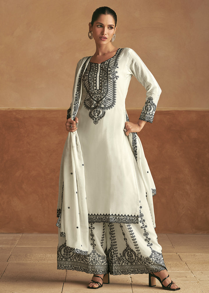 Buy Now Embroidered White Real Chinnon Palazzo Style Suit Online in USA, UK, Canada, Germany, Dubai & Worldwide at Empress Clothing. 