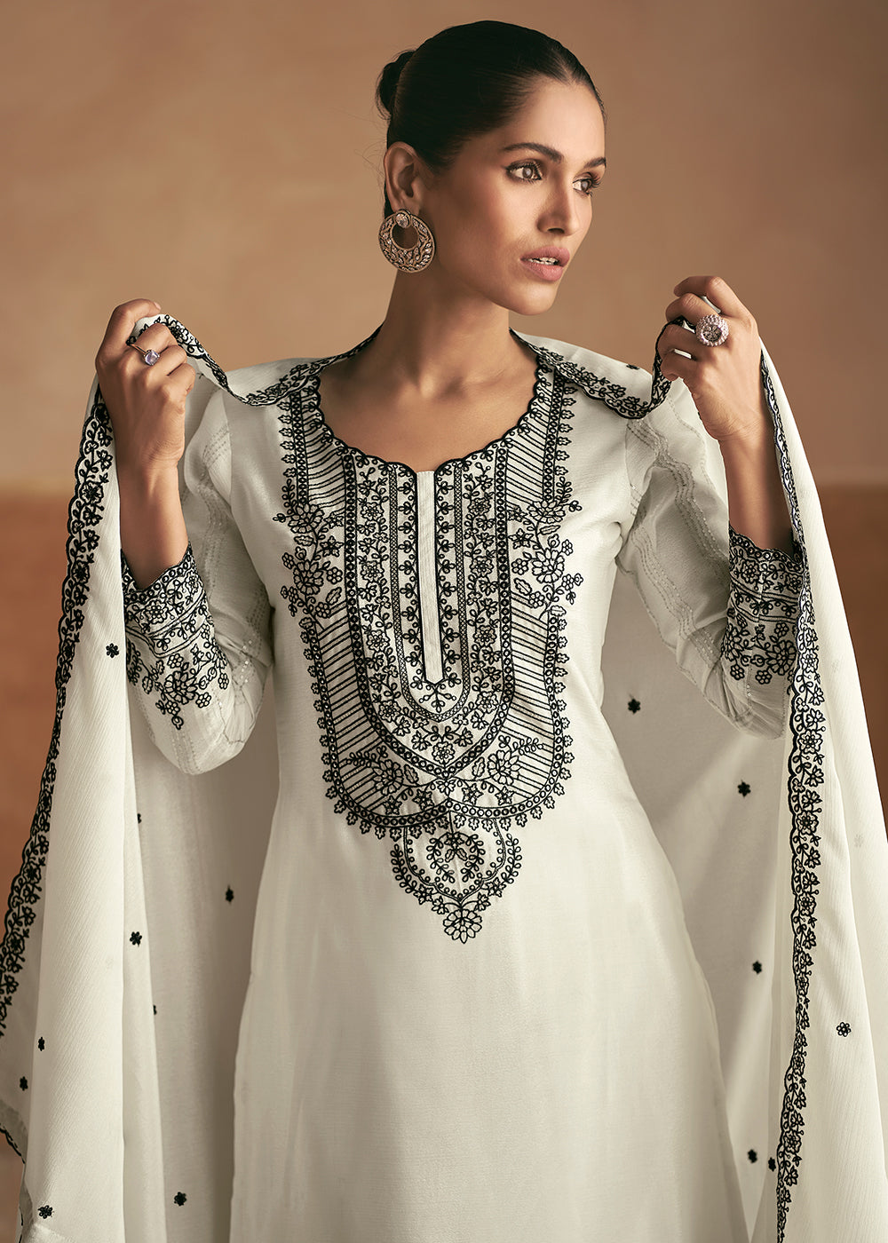 Buy Now Embroidered White Real Chinnon Palazzo Style Suit Online in USA, UK, Canada, Germany, Dubai & Worldwide at Empress Clothing. 